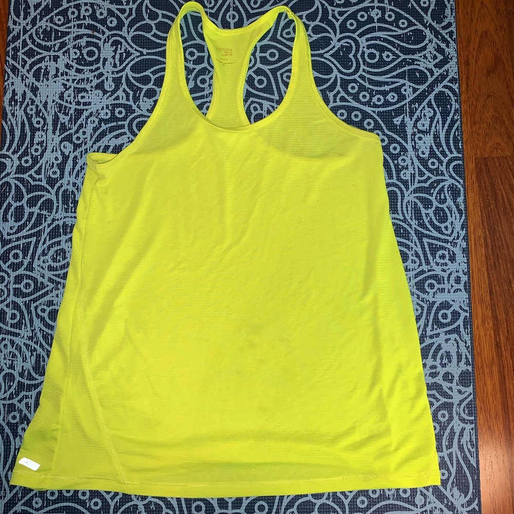 6 shirts for CHEAP!!! 1 workout shirt 2 half shirts and 3 tank tops.